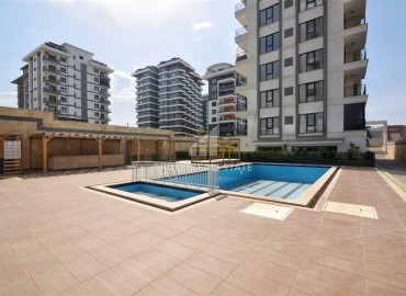 Стильная квартира с одной спальней, 50м², в новом комплексе премиум класса в центре Махмутлара, Алания ID-18262 фото-15