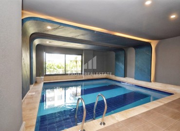 Стильная квартира с одной спальней, 50м², в новом комплексе премиум класса в центре Махмутлара, Алания ID-18262 фото-16