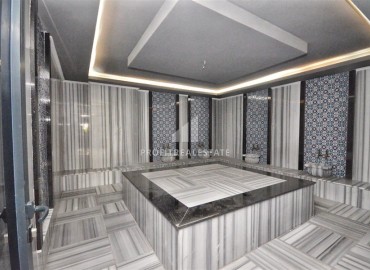 Стильная квартира с одной спальней, 50м², в новом комплексе премиум класса в центре Махмутлара, Алания ID-18262 фото-17