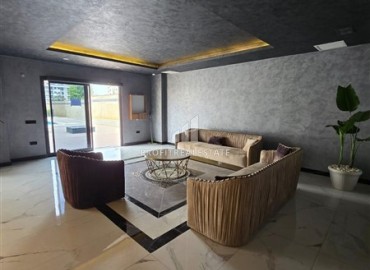 Стильная квартира с одной спальней, 50м², в новом комплексе премиум класса в центре Махмутлара, Алания ID-18262 фото-20