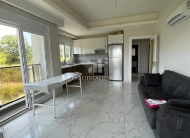 Частично меблированная квартира с двумя спальнями, 115м², в элитном комплексе в 900м от пляжа Инжекум в Авсалларе, Алания ID-18271 фото-2