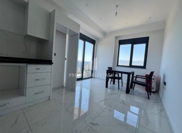 Новые апартаменты с одной спальней, 55м², в комфортабельном комплексе в районе Махмутлар, Алания, по привлекательной цене ID-18268 фото-1