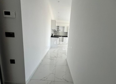 Новые апартаменты с одной спальней, 55м², в комфортабельном комплексе в районе Махмутлар, Алания, по привлекательной цене ID-18268 фото-5
