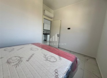 Новые апартаменты с одной спальней, 55м², в комфортабельном комплексе в районе Махмутлар, Алания, по привлекательной цене ID-18268 фото-8