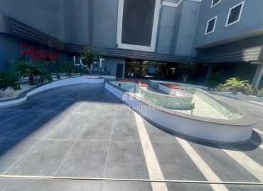 Новые апартаменты с одной спальней, 55м², в комфортабельном комплексе в районе Махмутлар, Алания, по привлекательной цене ID-18268 фото-18