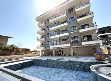 Двухкомнатные апартаменты, 45м², в новом малоквартирном комплексе с бассейном в районе Алании - Оба ID-18270 фото-1