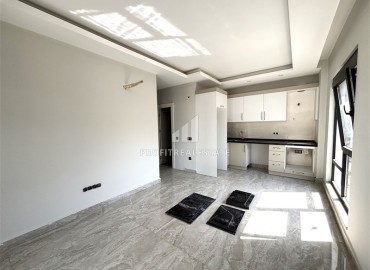 Двухкомнатные апартаменты, 45м², в новом малоквартирном комплексе с бассейном в районе Алании - Оба ID-18270 фото-3