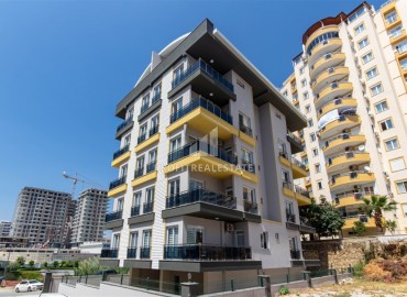 Квартира с двумя спальнями, 125м², с элегантным интерьером в современном доме городского типа в Махмутларе, Алания ID-18278 фото-1