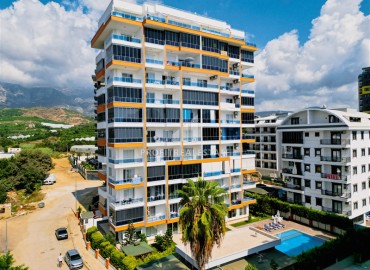 Меблированная двухкомнатная квартира, 55м², на высоком этаже в комфортабельной резиденции в Махмутларе, Алания ID-18280 фото-1