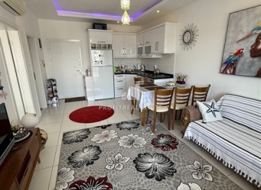 Меблированная двухкомнатная квартира, 55м², на высоком этаже в комфортабельной резиденции в Махмутларе, Алания ID-18280 фото-2