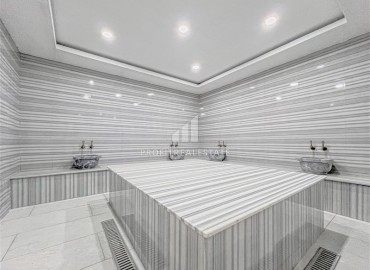 Меблированная двухкомнатная квартира, 55м², на высоком этаже в комфортабельной резиденции в Махмутларе, Алания ID-18280 фото-15
