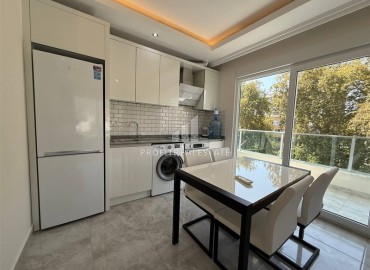 Апартаменты с одной спальней, 50м² с видом на море и горы в 400м от моря в Махмутларе, Алания. ID-18281 фото-2