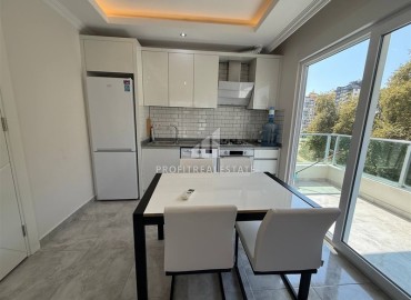 Апартаменты с одной спальней, 50м² с видом на море и горы в 400м от моря в Махмутларе, Алания. ID-18281 фото-3