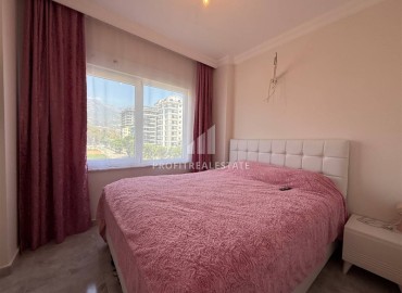 Апартаменты с одной спальней, 50м² с видом на море и горы в 400м от моря в Махмутларе, Алания. ID-18281 фото-7