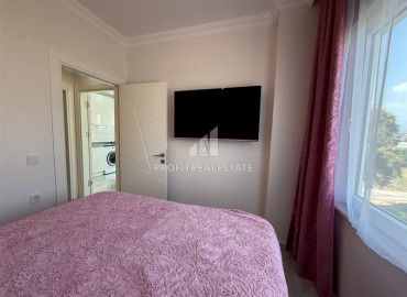 Апартаменты с одной спальней, 50м² с видом на море и горы в 400м от моря в Махмутларе, Алания. ID-18281 фото-8