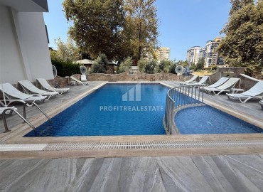 Апартаменты с одной спальней, 50м² с видом на море и горы в 400м от моря в Махмутларе, Алания. ID-18281 фото-14