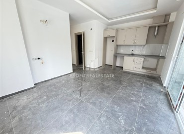 Двухкомнатная квартира, 45м², без мебели, в новостройке с бассейном в районе Махмутлар, Алания ID-18283 фото-2