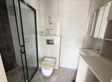 Двухкомнатная квартира, 45м², без мебели, в новостройке с бассейном в районе Махмутлар, Алания ID-18283 фото-10