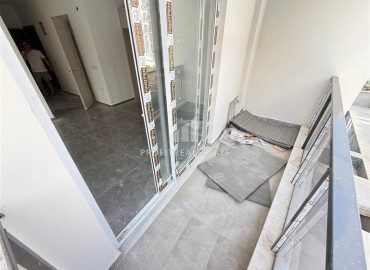 Двухкомнатная квартира, 45м², без мебели, в новостройке с бассейном в районе Махмутлар, Алания ID-18283 фото-12