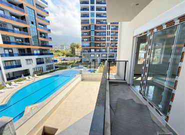 Двухкомнатная квартира, 45м², без мебели, в новостройке с бассейном в районе Махмутлар, Алания ID-18283 фото-14