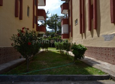 Эконом вариант, квартира в жилом комплексе с большим садом и лифтом в Махмутларе ID-1429 фото-3