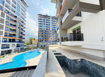 Двухкомнатная квартира, 45м², без мебели, в новостройке с бассейном в районе Махмутлар, Алания ID-18283 фото-17