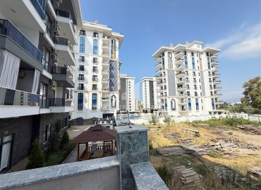 Двухкомнатная квартира, 45м², без мебели, в новостройке с бассейном в районе Махмутлар, Алания ID-18283 фото-18