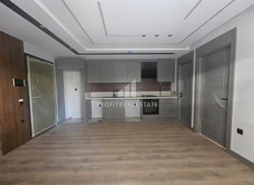 Новая недвижимость в Анталии: двухкомнатная квартира, 55м², в газифицированном комплексе в районе Муратпаша ID-18286 фото-1