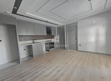 Новая недвижимость в Анталии: двухкомнатная квартира, 55м², в газифицированном комплексе в районе Муратпаша ID-18286 фото-3