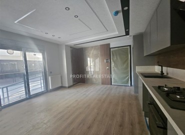 Новая недвижимость в Анталии: двухкомнатная квартира, 55м², в газифицированном комплексе в районе Муратпаша ID-18286 фото-5