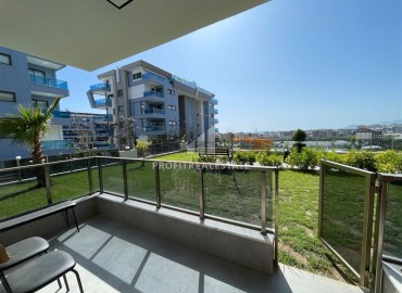 Двухкомнатная квартира, 50м², с выходом в сад в комплексе премиум класса в Каргыджаке, Алания, 700м от моря ID-17756 фото-9