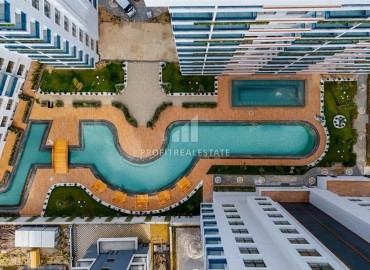 Элегантная квартира с одной спальней, 60м², в элитном комплексе 2024 года в районе Махмутлар, Алания ID-18290 фото-14