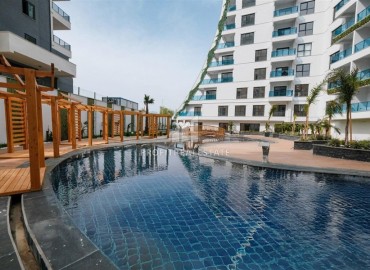 Элегантная квартира с одной спальней, 60м², в элитном комплексе 2024 года в районе Махмутлар, Алания ID-18290 фото-18