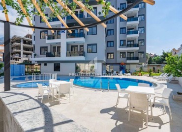 Квартира с одной спальней, 56м², с видом на море и Аланийскую крепость в комплексе с инфраструктурой в центре Алании ID-18292 фото-1