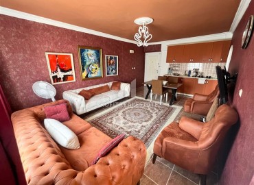 Недорогая меблированная квартира с одной спальней, 55м², в доме городского типа в Махмутларе, Алания ID-18294 фото-2