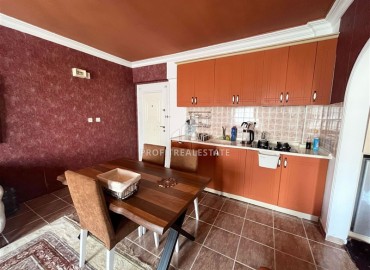 Недорогая меблированная квартира с одной спальней, 55м², в доме городского типа в Махмутларе, Алания ID-18294 фото-4