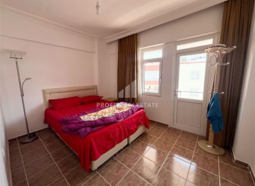 Недорогая меблированная квартира с одной спальней, 55м², в доме городского типа в Махмутларе, Алания ID-18294 фото-5