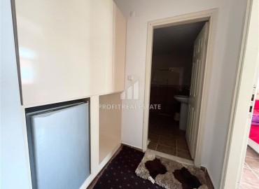 Недорогая меблированная квартира с одной спальней, 55м², в доме городского типа в Махмутларе, Алания ID-18294 фото-7