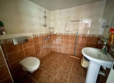 Недорогая меблированная квартира с одной спальней, 55м², в доме городского типа в Махмутларе, Алания ID-18294 фото-8