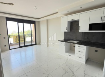 Апартаменты с одной спальней, 53м², в новостройке с отличной локацией в 200м от моря в районе Каргыджак, Алания ID-18304 фото-2