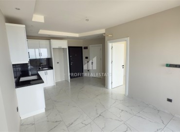 Апартаменты с одной спальней, 53м², в новостройке с отличной локацией в 200м от моря в районе Каргыджак, Алания ID-18304 фото-3