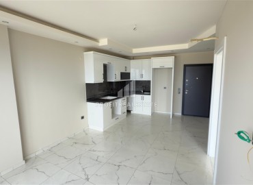 Апартаменты с одной спальней, 53м², в новостройке с отличной локацией в 200м от моря в районе Каргыджак, Алания ID-18304 фото-4