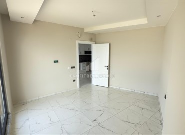 Апартаменты с одной спальней, 53м², в новостройке с отличной локацией в 200м от моря в районе Каргыджак, Алания ID-18304 фото-5