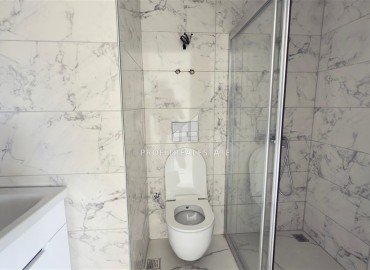 Апартаменты с одной спальней, 53м², в новостройке с отличной локацией в 200м от моря в районе Каргыджак, Алания ID-18304 фото-8