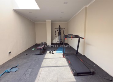 Апартаменты с одной спальней, 53м², в новостройке с отличной локацией в 200м от моря в районе Каргыджак, Алания ID-18304 фото-10