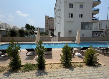 Апартаменты с одной спальней, 53м², в новостройке с отличной локацией в 200м от моря в районе Каргыджак, Алания ID-18304 фото-13