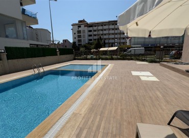 Апартаменты с одной спальней, 53м², в новостройке с отличной локацией в 200м от моря в районе Каргыджак, Алания ID-18304 фото-15