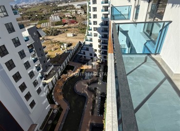 Апартаменты с одной спальней, 60м², в комплексе с отельной инфраструктурой в районе Махмутлар, Алания ID-17678 фото-15