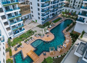 Апартаменты с одной спальней, 60м², в комплексе с отельной инфраструктурой в районе Махмутлар, Алания ID-17678 фото-19