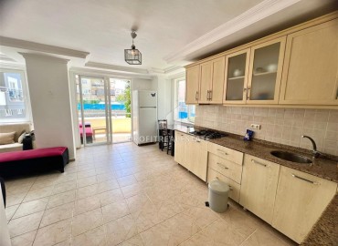 Меблированная двухкомнатная квартира, 80м² с удачной локацией в 500м от моря в Махмутларе, Алания ID-18309 фото-6